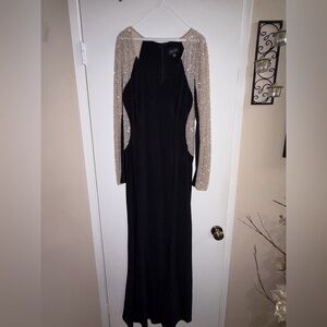 Xscape Black Rhinestone Illusion Sleeve Evening Gown – Elegant Formal Dress